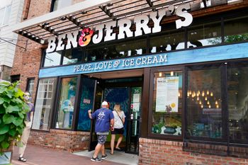 FILE - Two patrons enter a Ben & Jerry's Ice Cream shop, Tuesday, July 20, 2021, in Burlington.