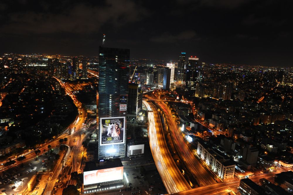 Nighttime view of the skyline of Tel Aviv, June 15, 2017.