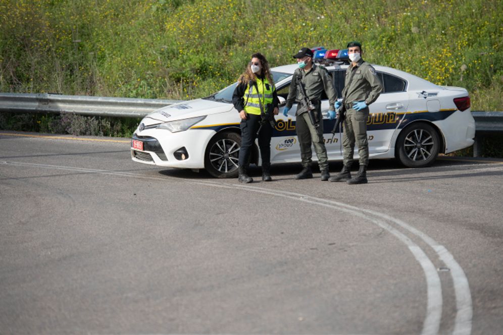 Israeli border police officers seen during the demolishing of six illegally built structures at the outpost of "Komi Ori", outside the Jewish settlement of Yitzhar, in the West Bank, April 22, 2020.