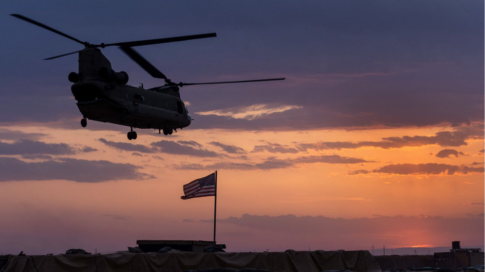 A US Army helicopter transporting American troops out of a remote combat outpost on May 25, 2021, near the Turkish border in northeastern Syria